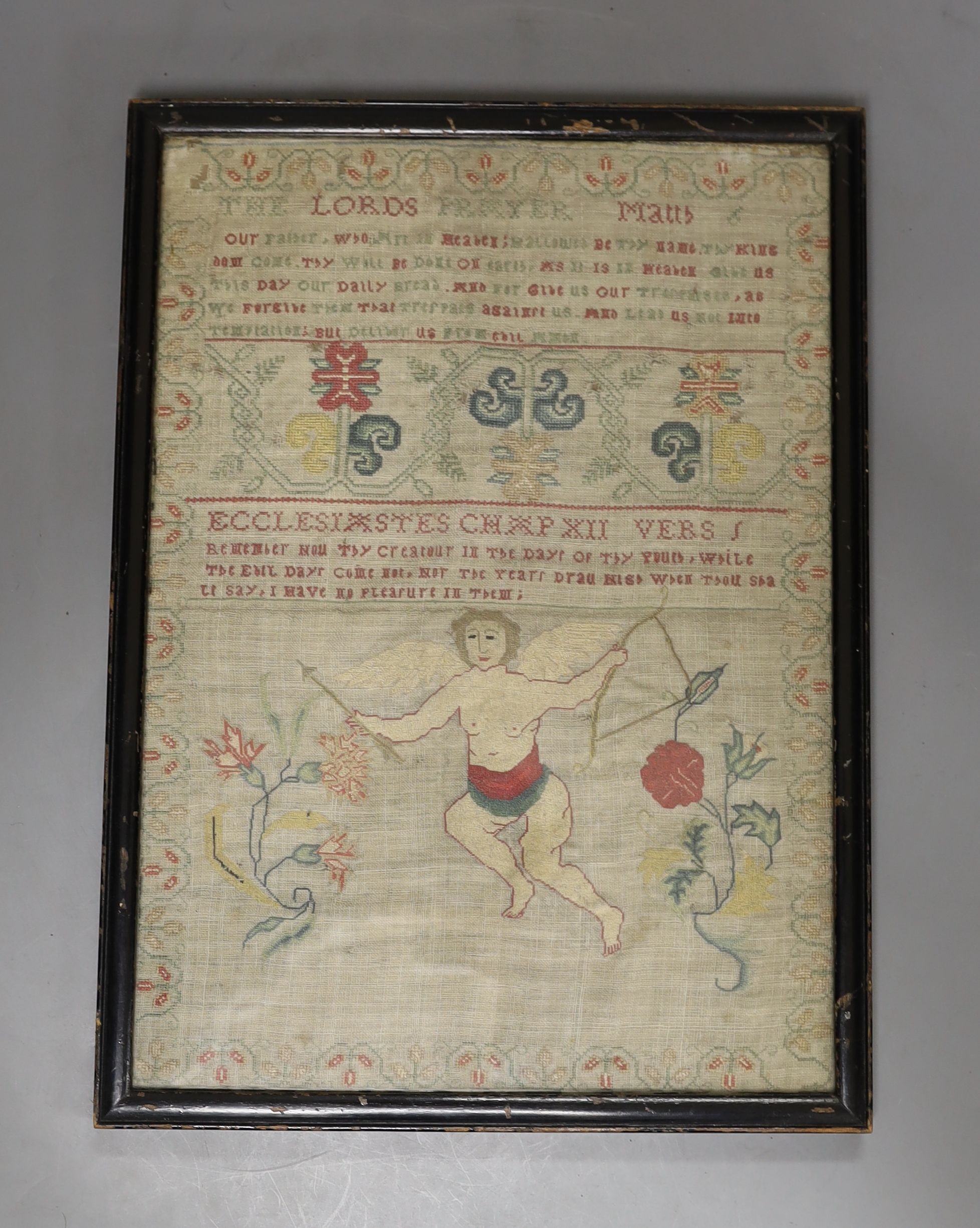 A George III finely embroidered Lords Prayer with angelic figure, flowers and text, 31 x 22cm, together with a later sampler, embroidered with house and trees, 35 x 29.5cm, both framed.